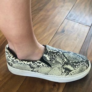 Snakeskin slip on sneaker type.